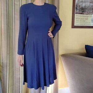Purple long-sleeved dress with flare skirt. Really fun for dancing! size 6